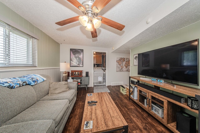 1361 Holmes Rd, Ypsilanti, MI 48198 - living room with a textured ceiling, wood finished floors, and ceiling fan
