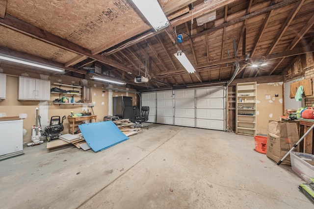 1361 Holmes Rd, Ypsilanti, MI 48198 - garage with a garage door opener