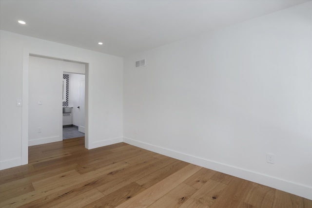 7280 Austin Rd, Saline, MI 48176 - spare room featuring light wood-style floors and recessed lighting