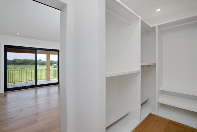 7280 Austin Rd, Saline, MI 48176 - spacious closet with wood finished floors