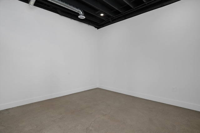 7280 Austin Rd, Saline, MI 48176 - spare room featuring baseboards and concrete floors