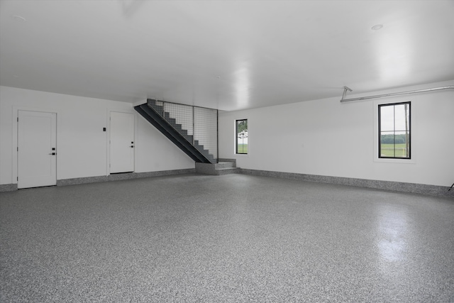 7280 Austin Rd, Saline, MI 48176 - garage featuring baseboards
