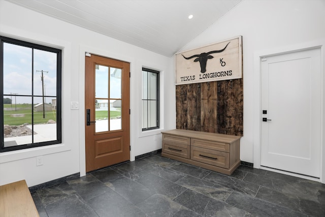 7280 Austin Rd, Saline, MI 48176 - mudroom featuring plenty of natural light, lofted ceiling, dark stone finish floors, and recessed lighting