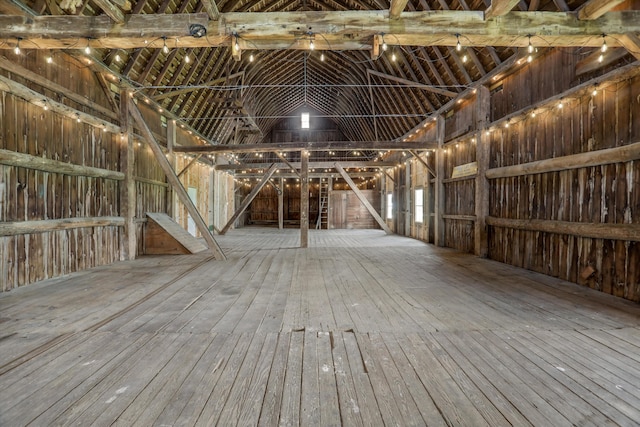 7280 Austin Rd, Saline, MI 48176 - miscellaneous room with hardwood / wood-style flooring and vaulted ceiling