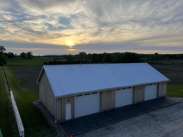 7280 Austin Rd, Saline, MI 48176 - detached garage featuring a view of rural / pastoral area