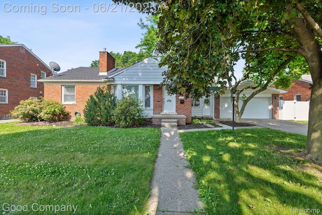3603 Dukeshire Hwy, Royal Oak, MI 48073 - view of front of property featuring brick siding, driveway, a front yard, and a chimney