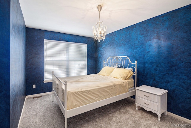 6438 Club Ct W, Grand Blanc, MI 48439 - carpeted bedroom with a chandelier and baseboards
