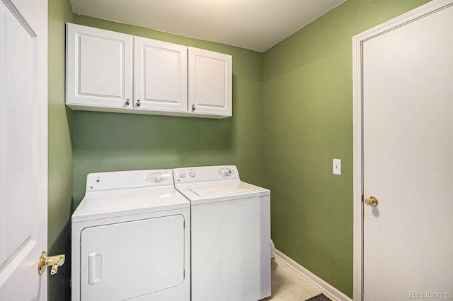 6438 Club Ct W, Grand Blanc, MI 48439 - laundry room with washing machine and dryer and cabinet space