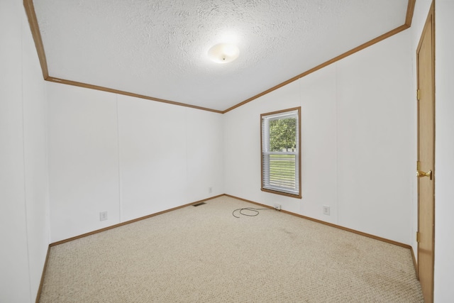 3280 Carlton Blvd, Jackson, MI 49203 - carpeted empty room featuring vaulted ceiling, crown molding, and a textured ceiling