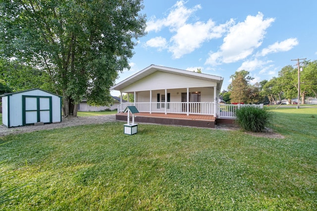 3280 Carlton Blvd, Jackson, MI 49203 - back of house with covered porch, a storage unit, and a yard