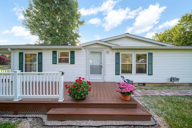3280 Carlton Blvd, Jackson, MI 49203 - rear view of property featuring a wooden deck