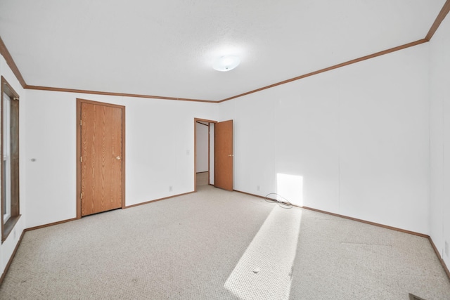 3280 Carlton Blvd, Jackson, MI 49203 - unfurnished bedroom featuring crown molding, light carpet, and a closet