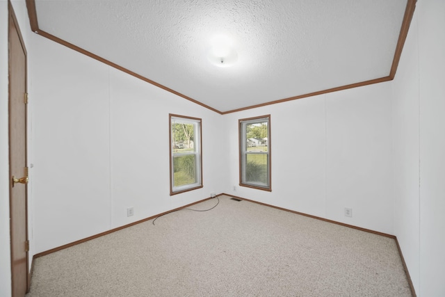 3280 Carlton Blvd, Jackson, MI 49203 - carpeted spare room featuring vaulted ceiling, a textured ceiling, and ornamental molding