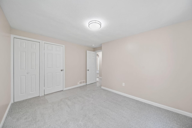 10620 Cady Rd, Jackson, MI 49201 - unfurnished bedroom with carpet floors and baseboards