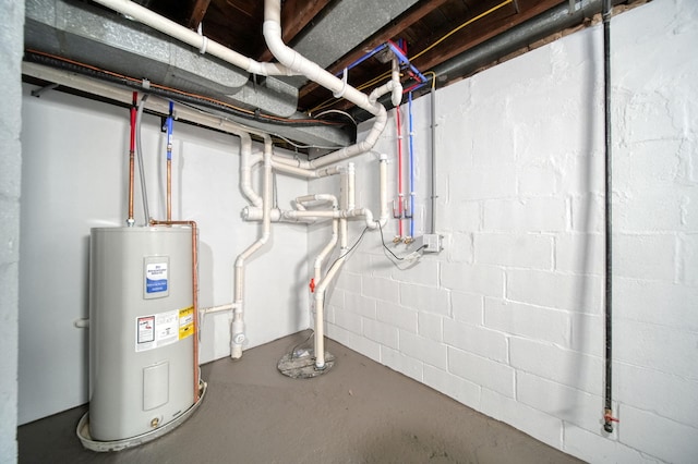 10620 Cady Rd, Jackson, MI 49201 - unfinished basement featuring electric water heater and concrete block wall