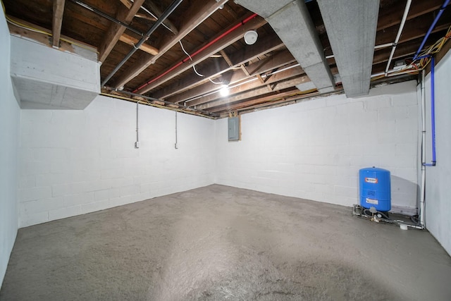 10620 Cady Rd, Jackson, MI 49201 - unfinished below grade area with a water pressure tank and electric panel