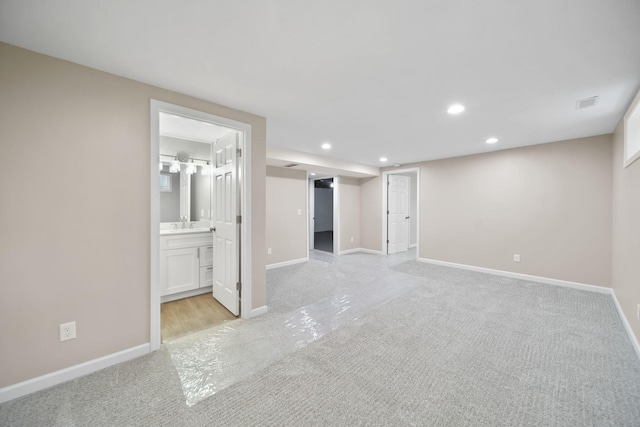 10620 Cady Rd, Jackson, MI 49201 - spare room featuring light carpet and recessed lighting