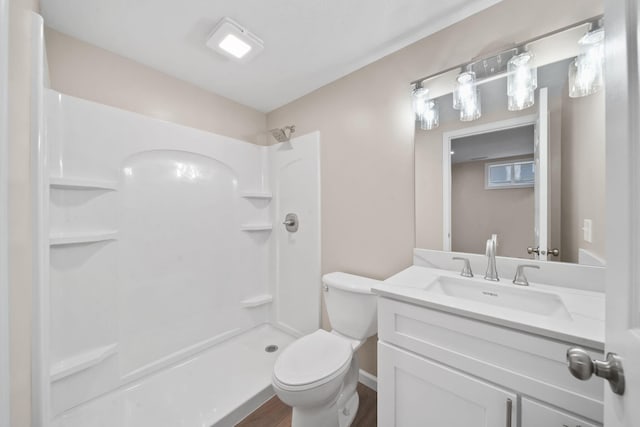 10620 Cady Rd, Jackson, MI 49201 - full bathroom with vanity, a shower, and wood finished floors