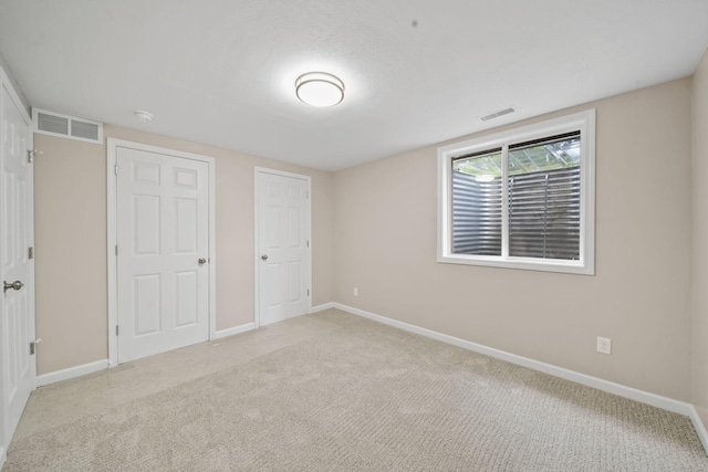 10620 Cady Rd, Jackson, MI 49201 - unfurnished bedroom featuring carpet flooring and baseboards