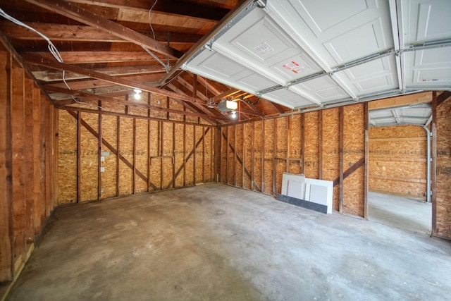 10620 Cady Rd, Jackson, MI 49201 - garage featuring a garage door opener