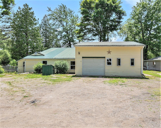 8828 Elm, Fremont, MI 49412 - garage with driveway