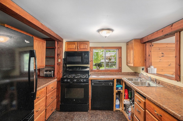 8828 Elm, Fremont, MI 49412 - kitchen with black appliances, brown cabinetry, and light countertops
