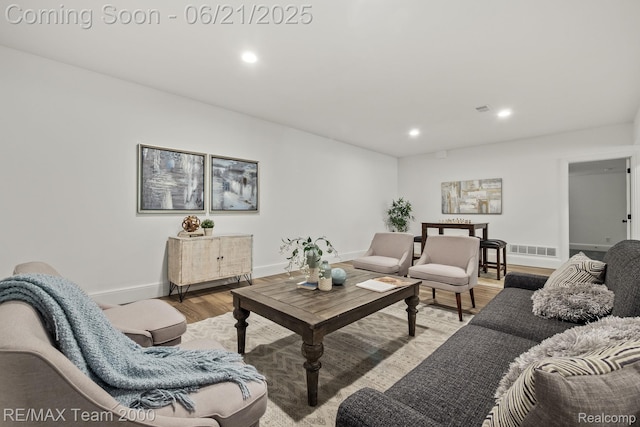 32575 Romsey Rd, Franklin, MI 48025 - living area with light wood-style flooring and recessed lighting
