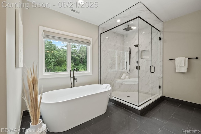 32575 Romsey Rd, Franklin, MI 48025 - full bath with a freestanding bath and a marble finish shower
