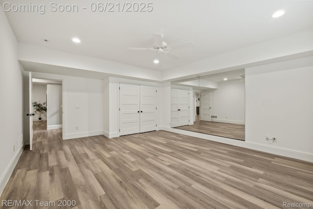 32575 Romsey Rd, Franklin, MI 48025 - unfurnished living room featuring recessed lighting, light wood finished floors, and ceiling fan