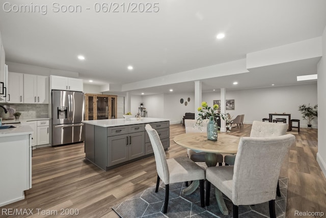 32575 Romsey Rd, Franklin, MI 48025 - dining area with dark wood-style floors and recessed lighting