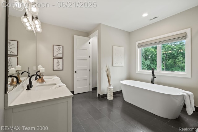 32575 Romsey Rd, Franklin, MI 48025 - full bathroom with double vanity and a freestanding bath