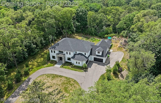 32575 Romsey Rd, Franklin, MI 48025 - aerial view of property and surrounding area with a heavily wooded area