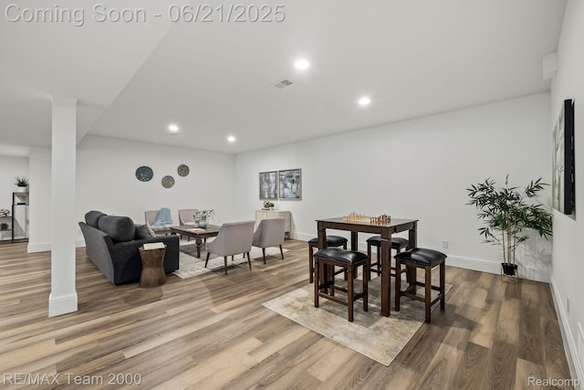 32575 Romsey Rd, Franklin, MI 48025 - dining room with wood finished floors and recessed lighting