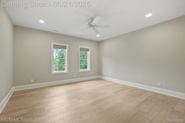 32575 Romsey Rd, Franklin, MI 48025 - spare room featuring a ceiling fan, light wood-style flooring, and recessed lighting
