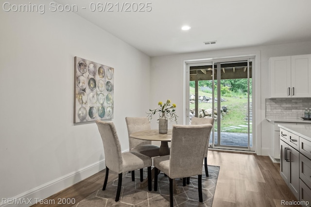 32575 Romsey Rd, Franklin, MI 48025 - dining area with wood finished floors and recessed lighting