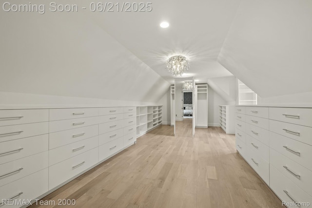 32575 Romsey Rd, Franklin, MI 48025 - additional living space with light wood-type flooring, vaulted ceiling, a chandelier, and recessed lighting