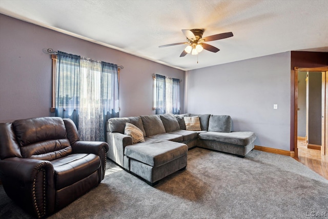 14211 Gilbert Rd, Waldron, MI 49288 - living area with a ceiling fan and carpet floors