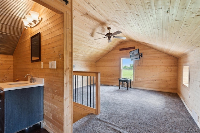 14211 Gilbert Rd, Waldron, MI 49288 - bonus room with wooden walls, lofted ceiling, wooden ceiling, ceiling fan, and carpet floors