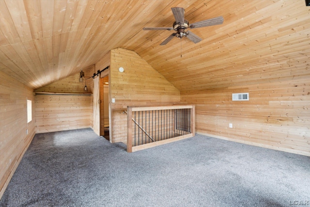 14211 Gilbert Rd, Waldron, MI 49288 - bonus room with wooden walls, lofted ceiling, wood ceiling, a ceiling fan, and carpet