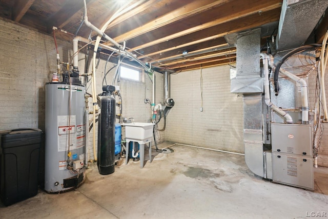 14211 Gilbert Rd, Waldron, MI 49288 - below grade area with gas water heater and a water softener