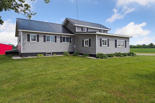 14211 Gilbert Rd, Waldron, MI 49288 - view of front of house with a front yard and a metal roof