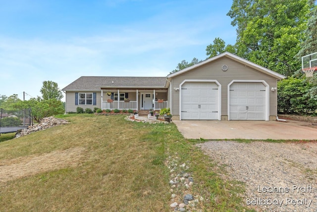 127 Hamilton Ln, Dowling, MI 49050 - ranch-style house featuring a porch, a front yard, driveway, and a garage