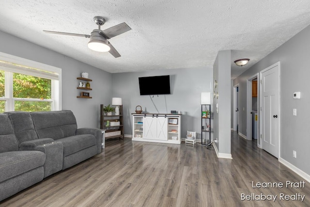 127 Hamilton Ln, Dowling, MI 49050 - living area with a textured ceiling, wood finished floors, and ceiling fan