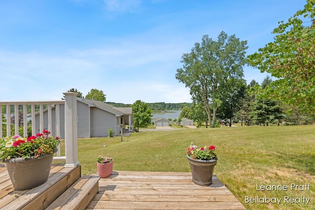 127 Hamilton Ln, Dowling, MI 49050 - wooden terrace with a yard