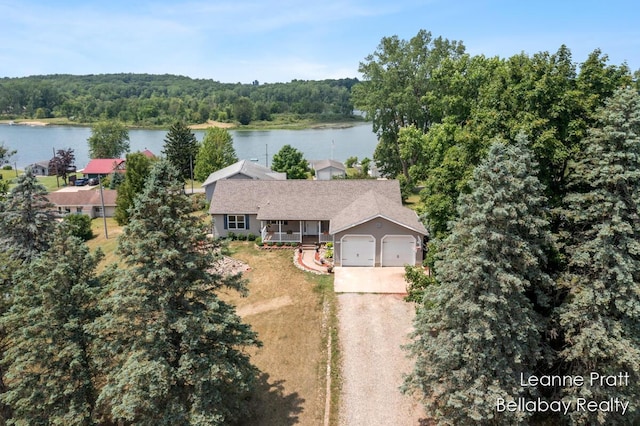 127 Hamilton Ln, Dowling, MI 49050 - view of subject property featuring a nearby body of water and a heavily wooded area
