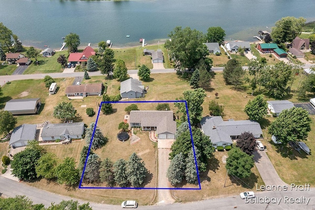 127 Hamilton Ln, Dowling, MI 49050 - aerial perspective of suburban area with a nearby body of water and property parcel outlined