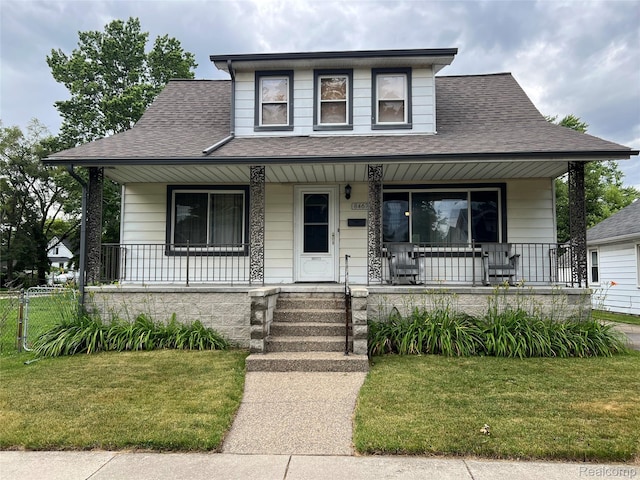 8467 Central St, Center Line, MI 48015 - view of front facade featuring a porch and a shingled roof