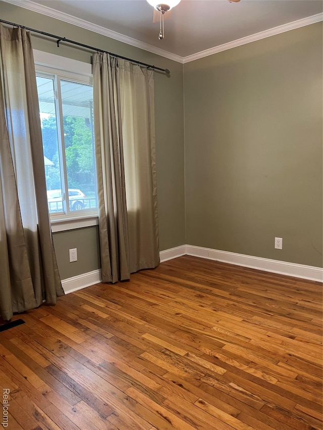 8467 Central St, Center Line, MI 48015 - unfurnished room featuring hardwood / wood-style floors and ornamental molding