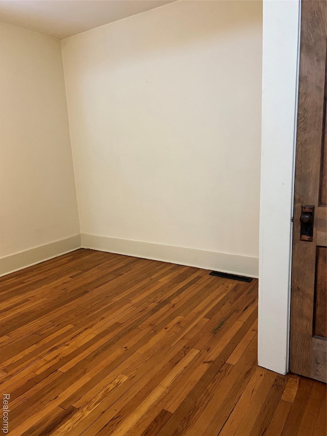 8467 Central St, Center Line, MI 48015 - empty room with light wood finished floors and baseboards