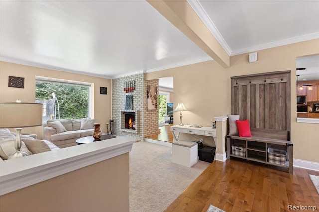 1101 Shallowdale Dr, Troy, MI 48085 - living room featuring hardwood / wood-style flooring, a fireplace, and crown molding